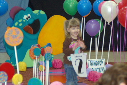 Little Girl Heading to the Gumdrop Mountains